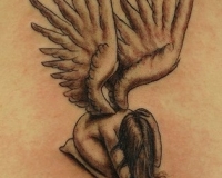 tatoo ange triste