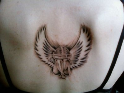 tatoo ange triste