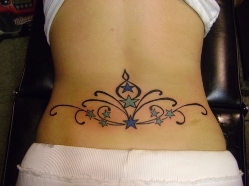 tatoo bas du dos arabesque