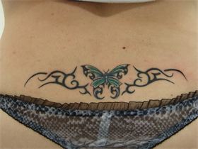 tatoo bas du dos femme papillon