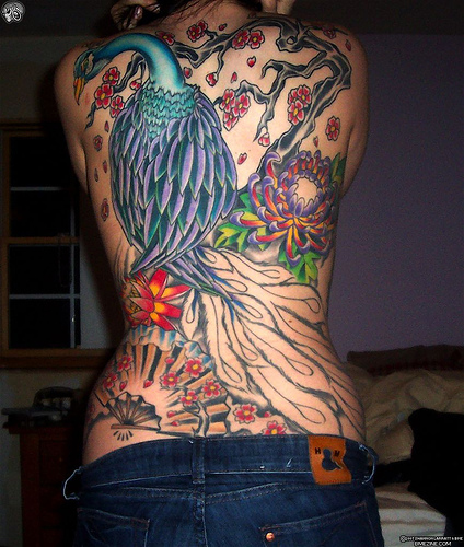 tatoo dos complet femme