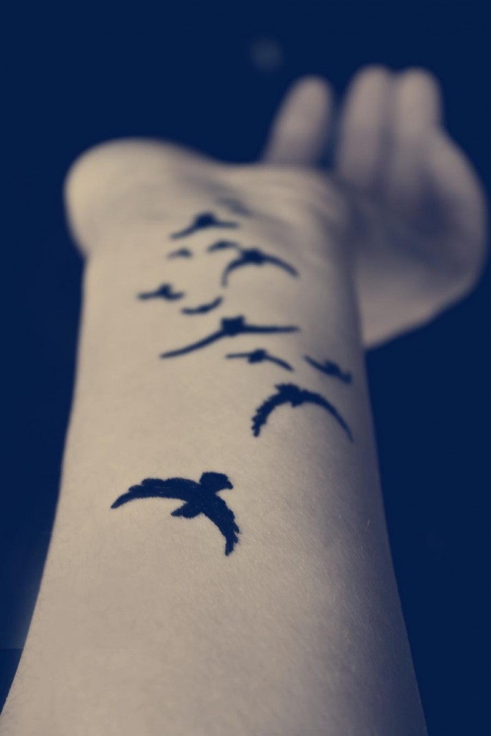 tatoo oiseau bras