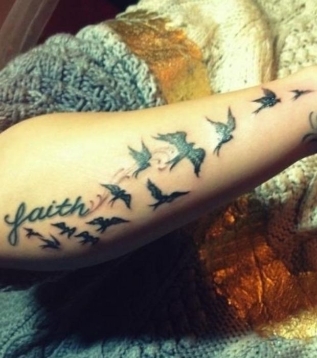 tatoo oiseau bras