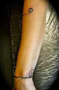 tatouage avant bras arabesque