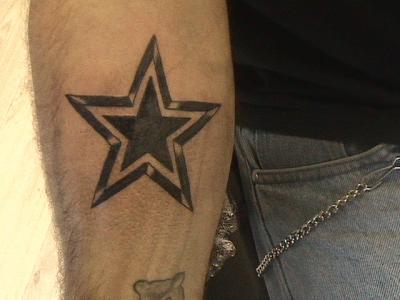 tatouage avant bras etoile