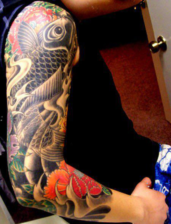 tatouage avant bras homme carpe koi