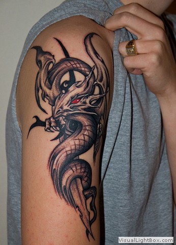 tatouage avant bras homme dragon