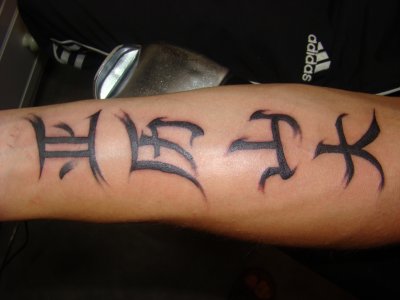 tatouage avant bras lettre chinoise