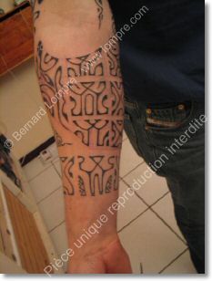 tatouage avant bras marquisien