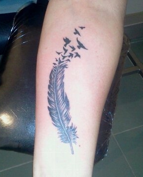 tatouage avant bras oiseau