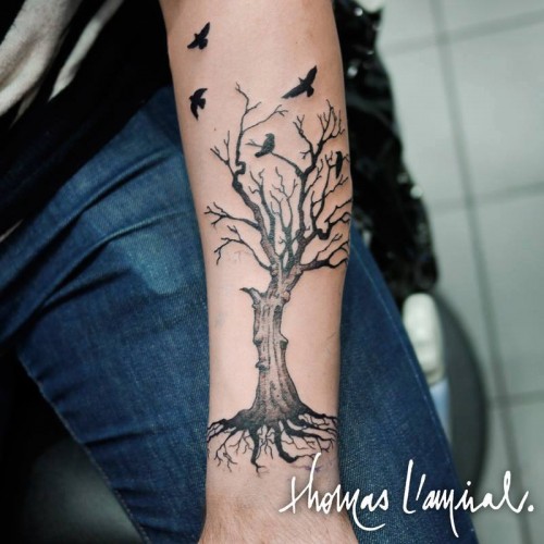 tatouage avant bras oiseau