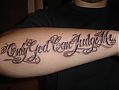 tatouage avant bras only god can judge me
