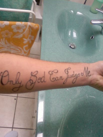 tatouage avant bras only god can judge me