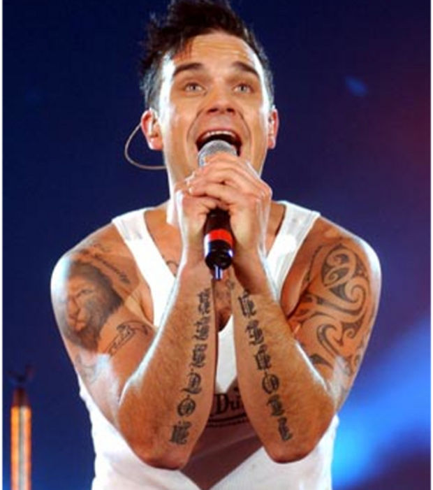tatouage avant bras robbie williams