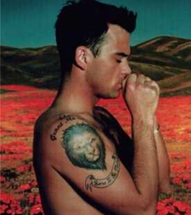 tatouage avant bras robbie williams