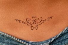 tatouage bas du dos femme étoile