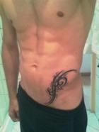 tatouage bas ventre tribal