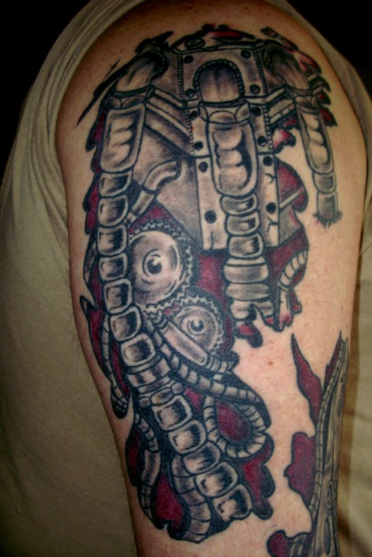 tatouage biomecanique cheville