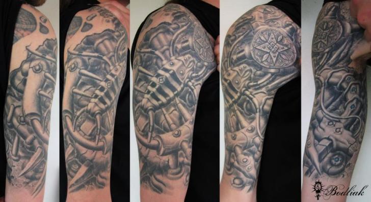 tatouage biomecanique cheville