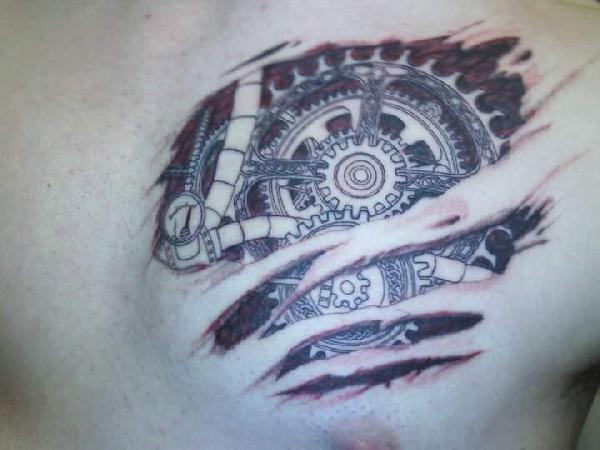 tatouage biomecanique engrenage