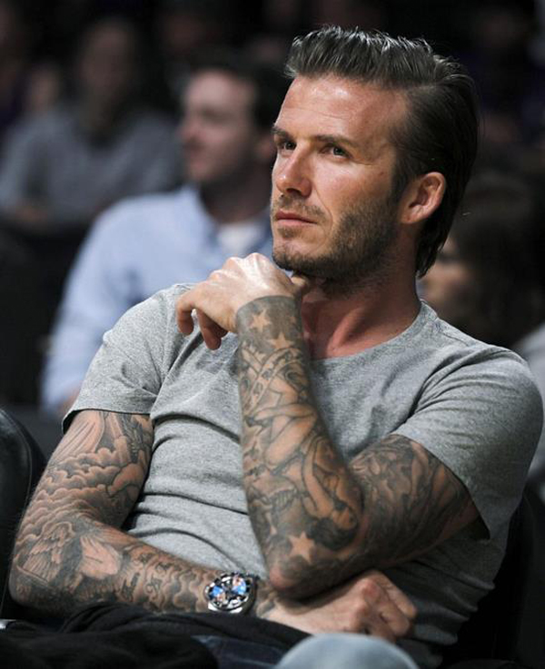 Tatouage bras complet beckham