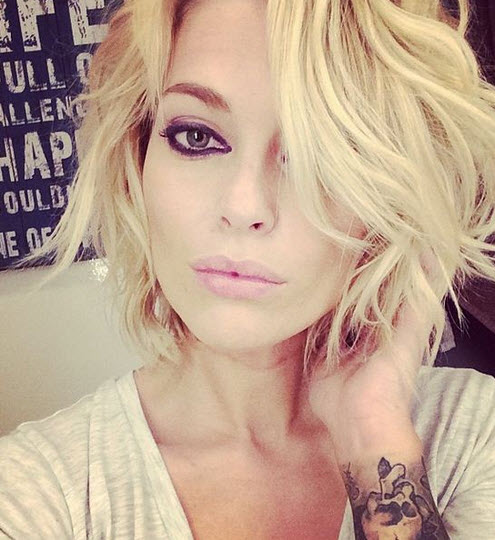 tatouage bras gauche caroline receveur