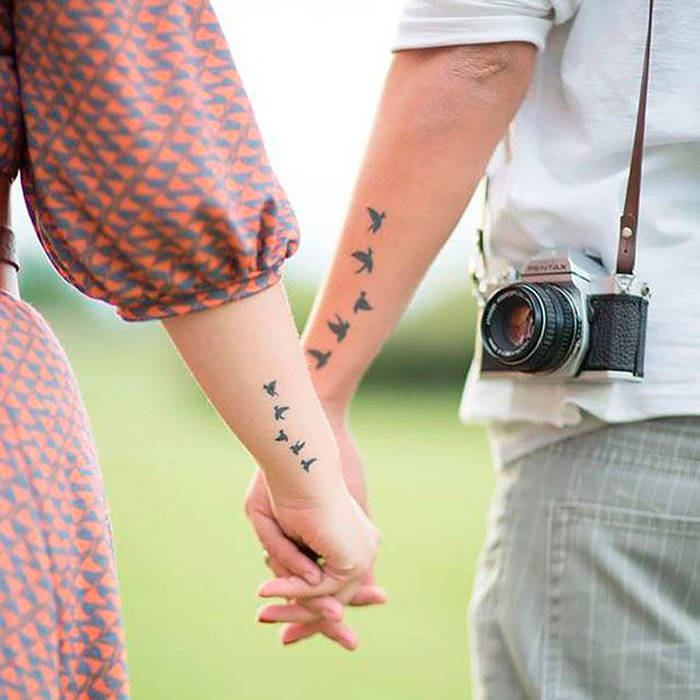 tatouage couple hirondelle