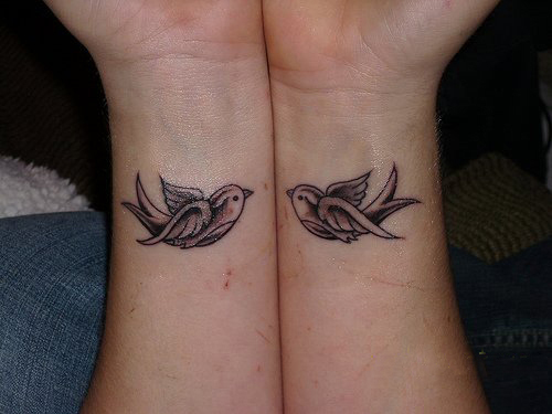 tatouage couple hirondelle