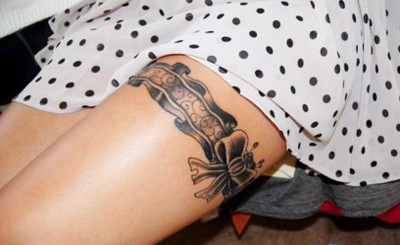 tatouage cuisse femme image