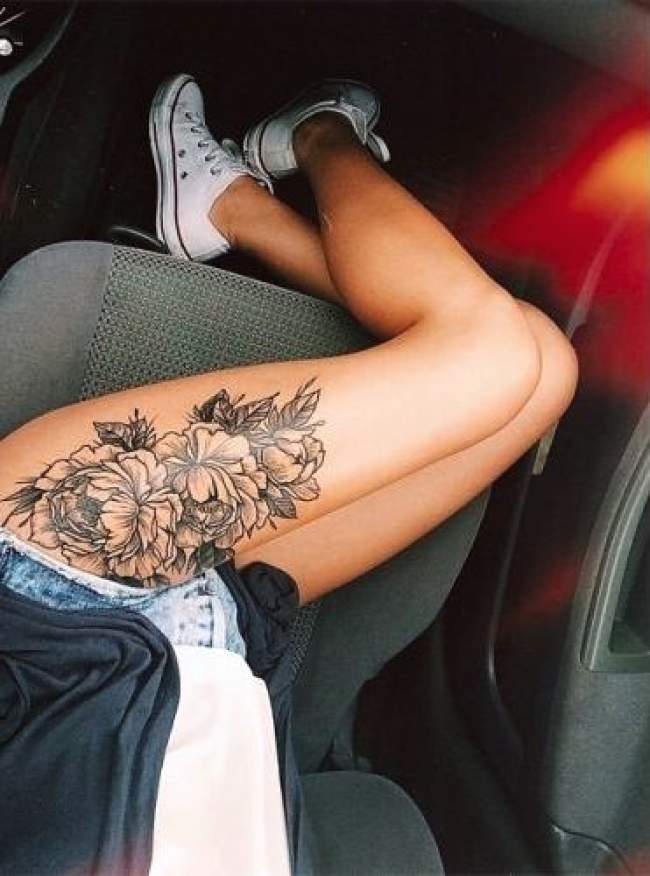 tatouage cuisse femme image