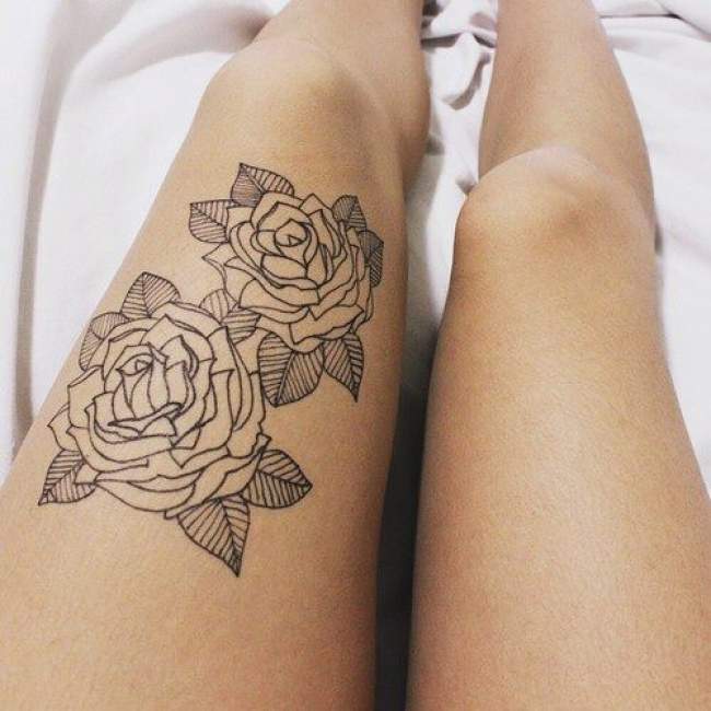 tatouage cuisse femme rose