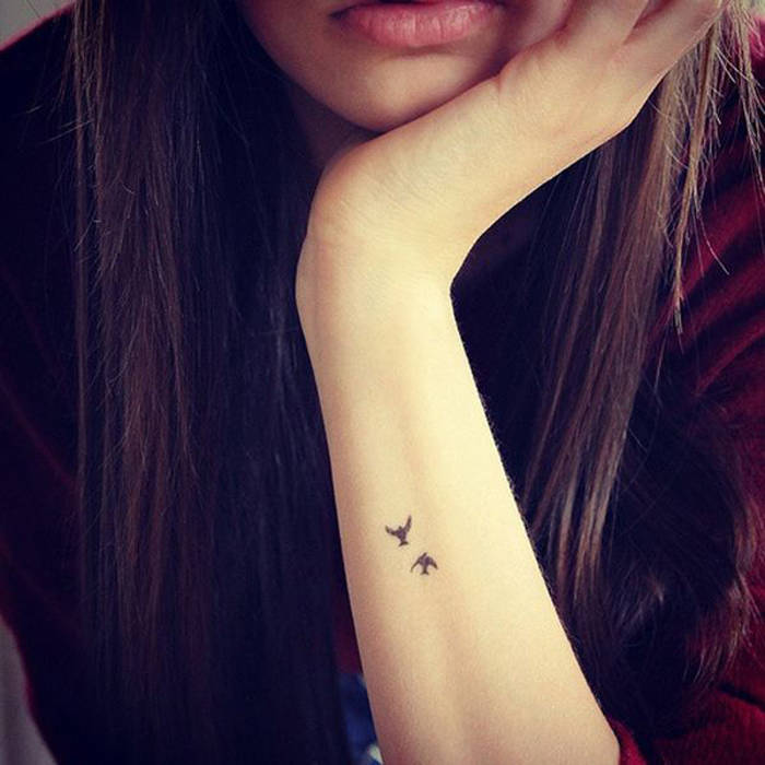 tatouage discret bras