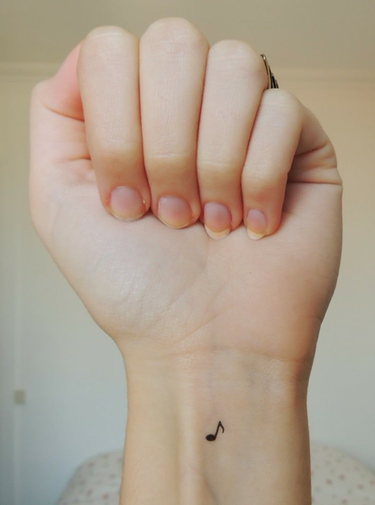 tatouage discret musique