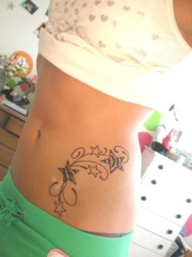 tatouage femme discret ventre
