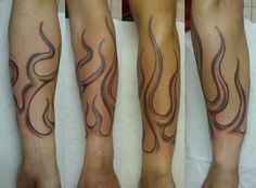 tatouage flamme avant bras noir