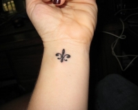 tatouage fleur de lys quebec