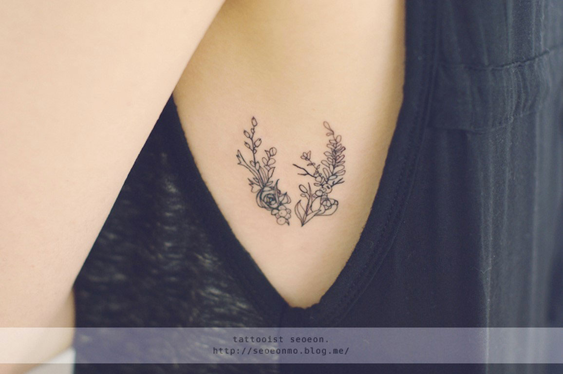 tatouage fleur fin