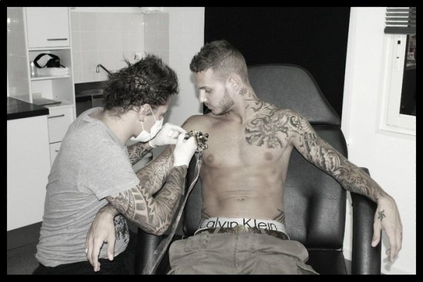 tatouage fleur m pokora