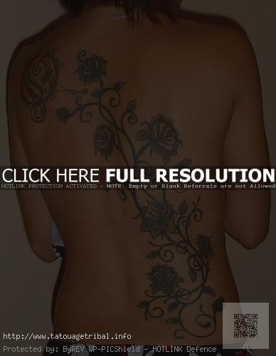 tatouage fleur tribal dos