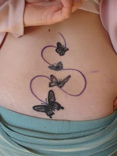 tatouage haut du dos femme papillon