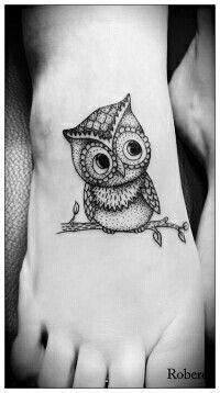tatouage hibou nuque