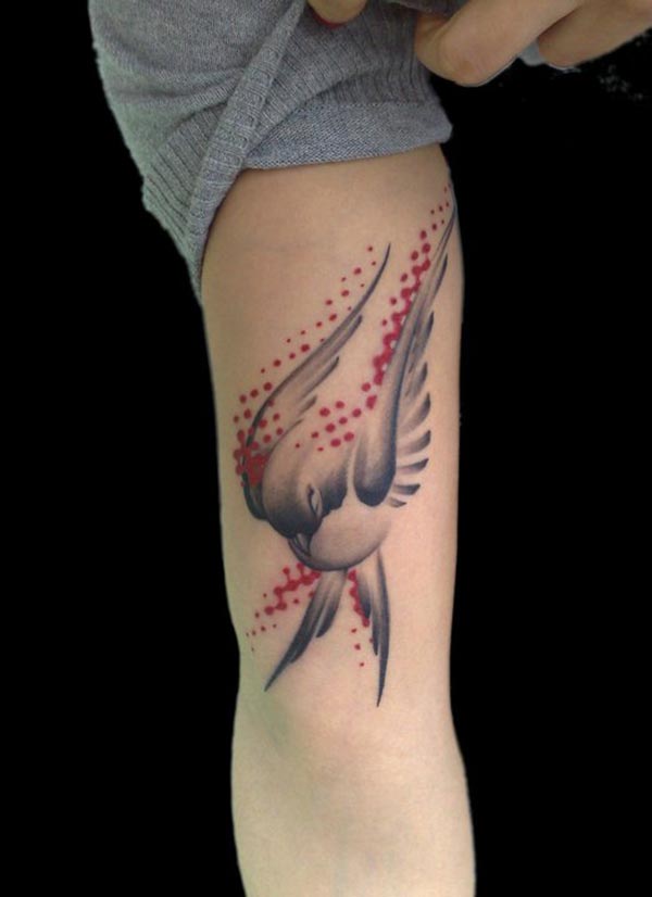 tatouage hirondelle bras