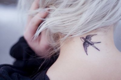 tatouage hirondelle chanel