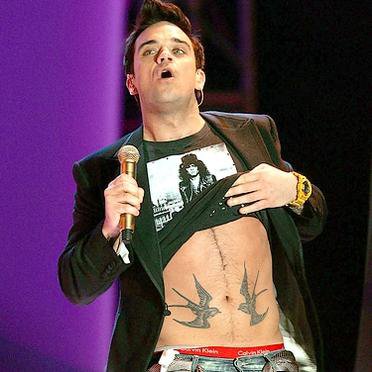tatouage hirondelle robbie william