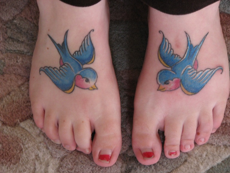 tatouage hirondelle symbole