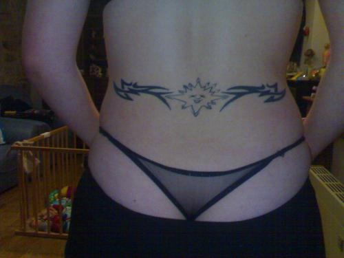 tatouage infini bas du dos