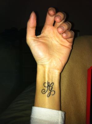 tatouage initiale g