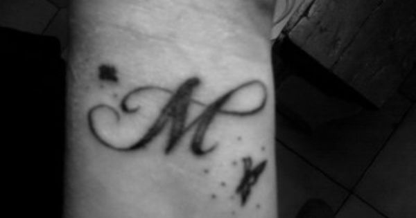 tatouage initiale l et m