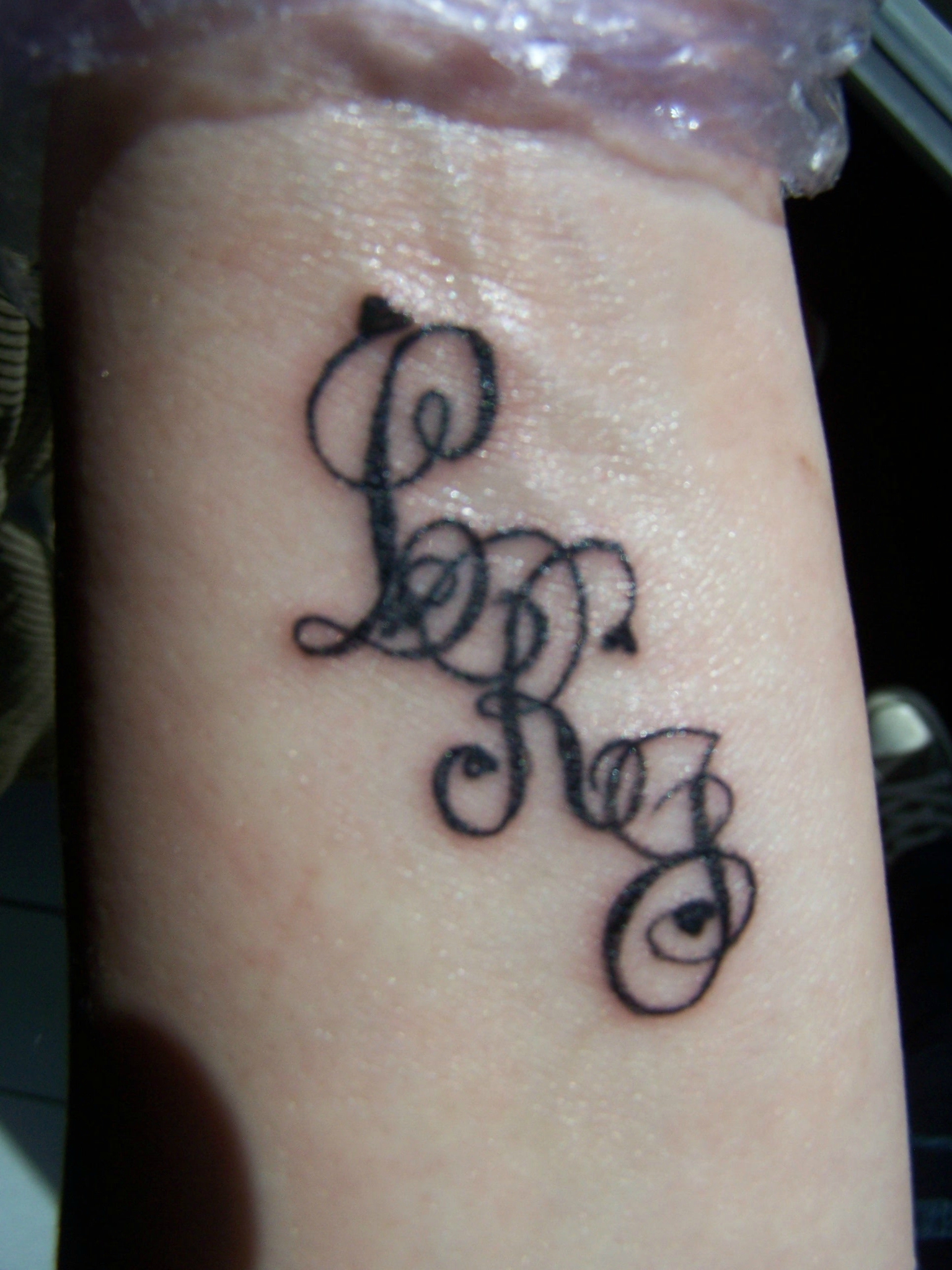 tatouage initiale p
