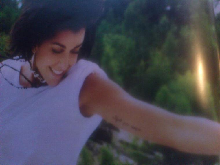 tatouage jenifer bras gauche